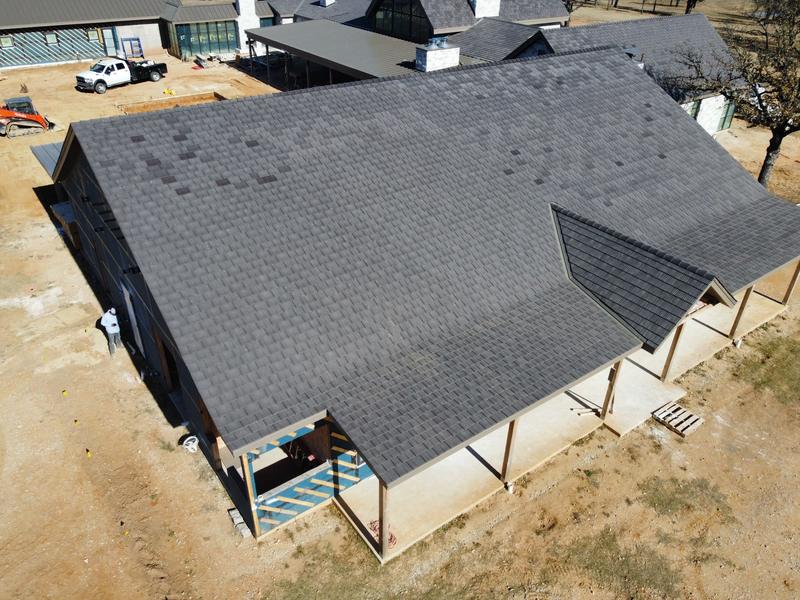 Drone photo of a full composite shake roof system on a Clay County ranch estate