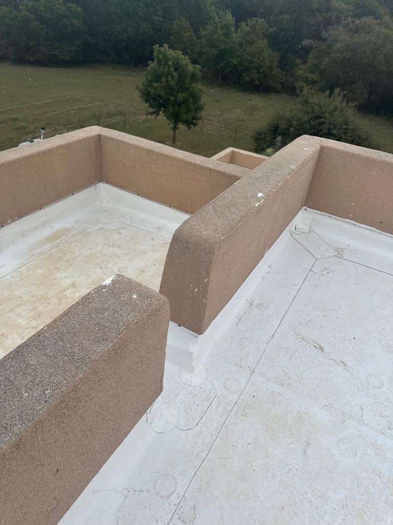 TPO parapet wraps and inside corners on a residential flat roof